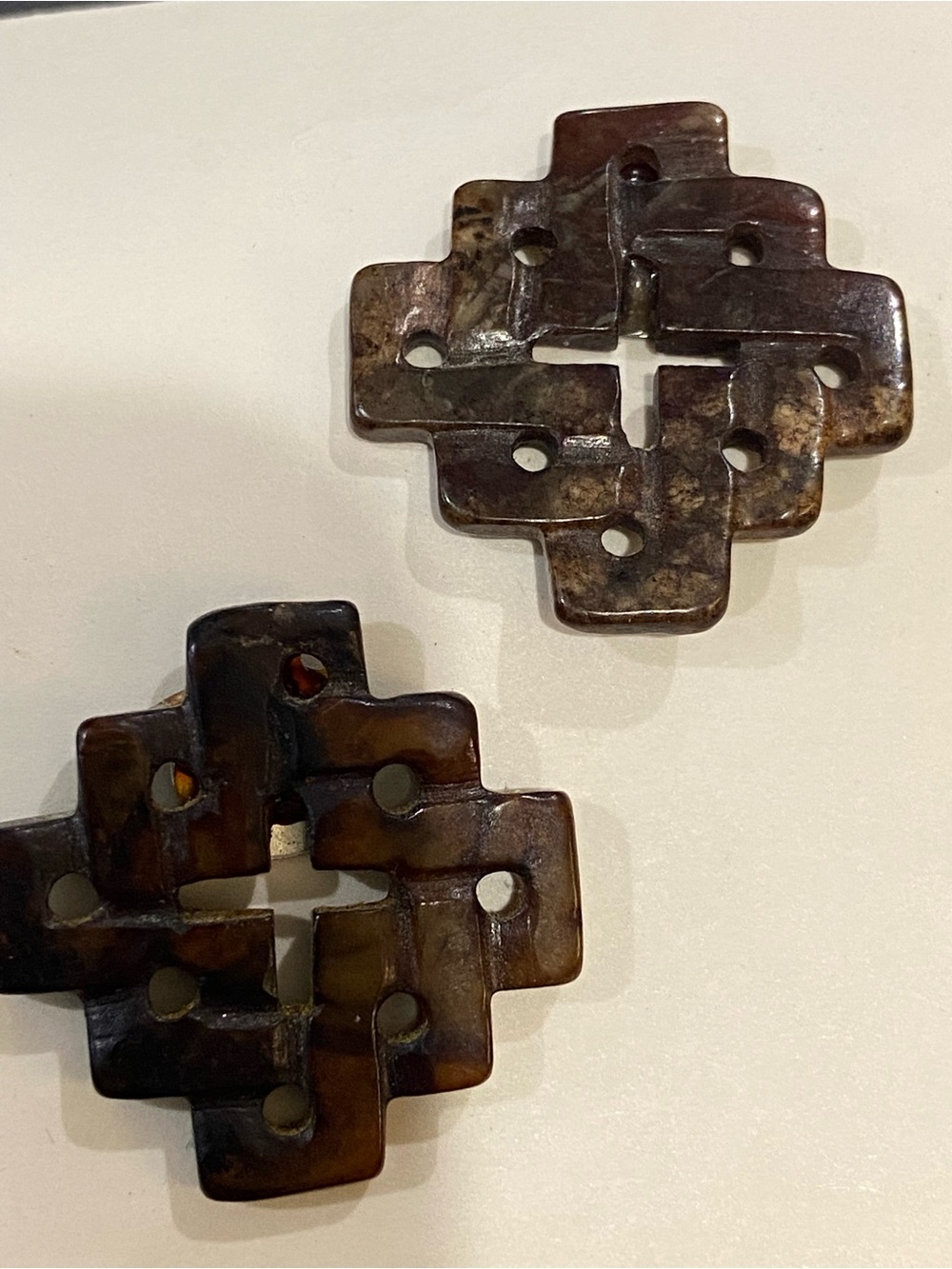 Carved Brown Jade Pierced Earrings. Endless knot design.